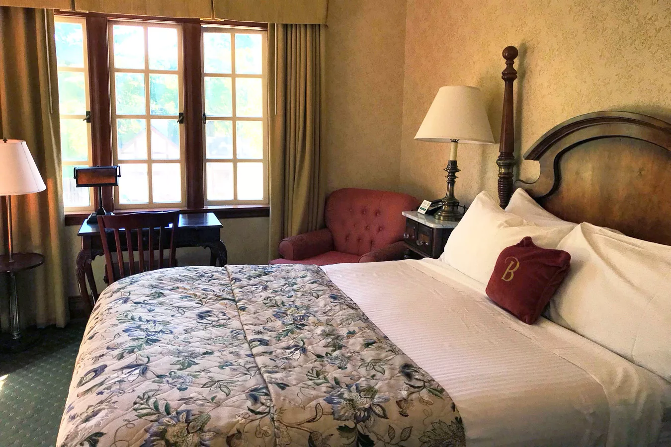 banner image is of Queen Balcony room bed at Benbow Historic Inn