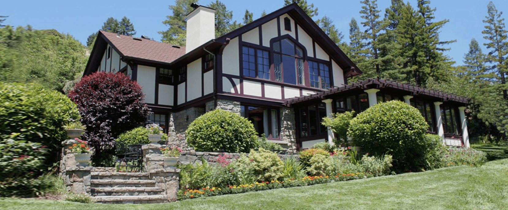 banner image is of exterior of the Julia Morgan Redwood Grove House